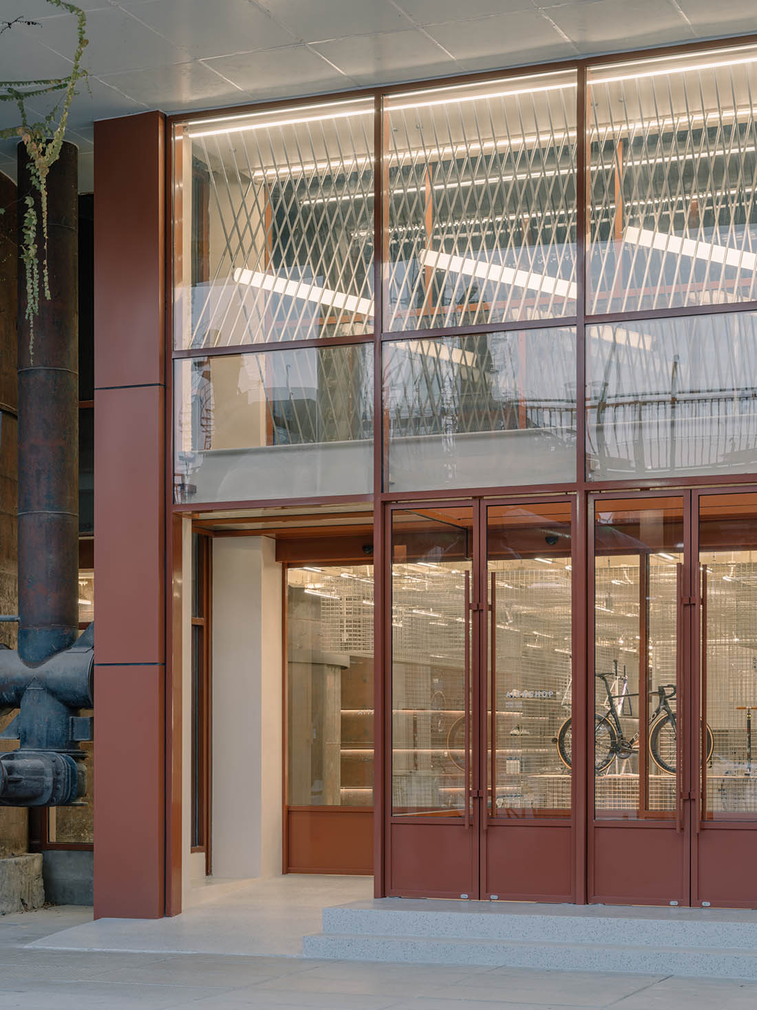 厂房改造,骑行空间,俱乐部设计,骑行俱乐部,自行车骑行俱乐部设计,商店设计,工业风骑行俱乐部,骑行店设计,AITASHOP北京751园区骑行空间,北京,Yatofu Creatives也兜设计