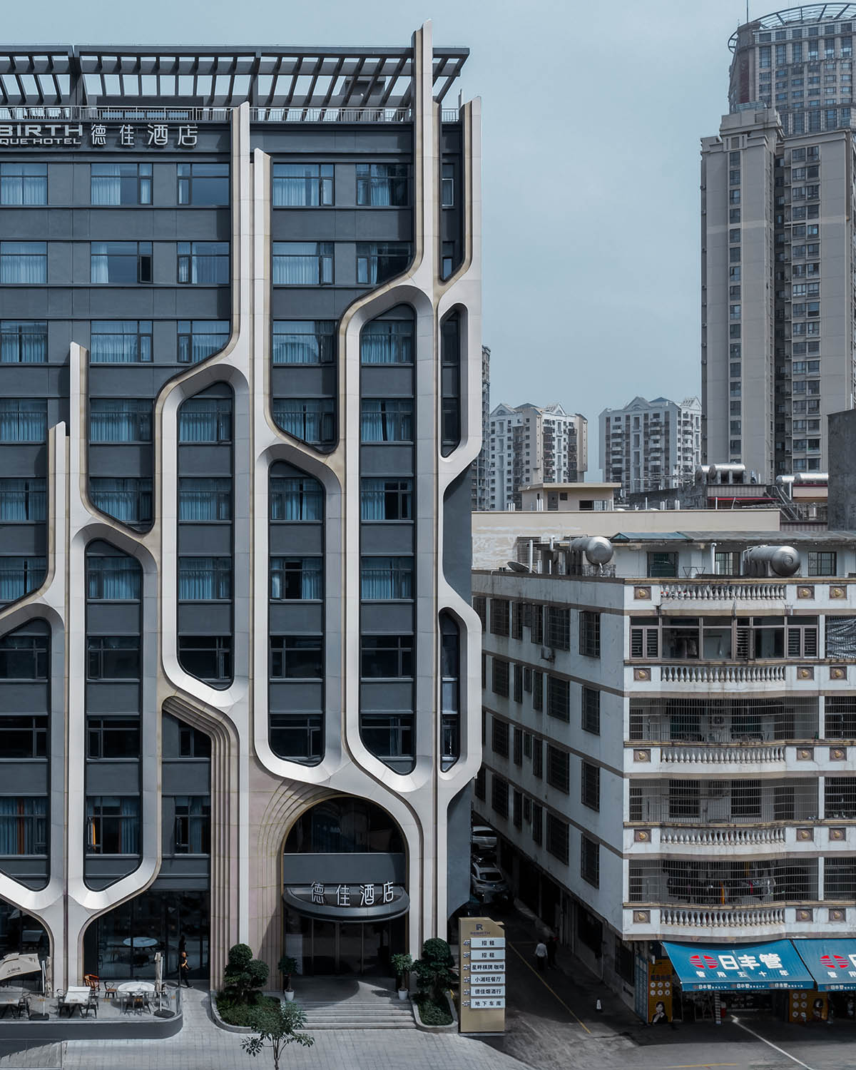 外立面改造,建筑外立面改造,酒店外立面改造,酒店外立面设计,建筑改造,海口德佳酒店立面改造,海口,源合万相建筑设计